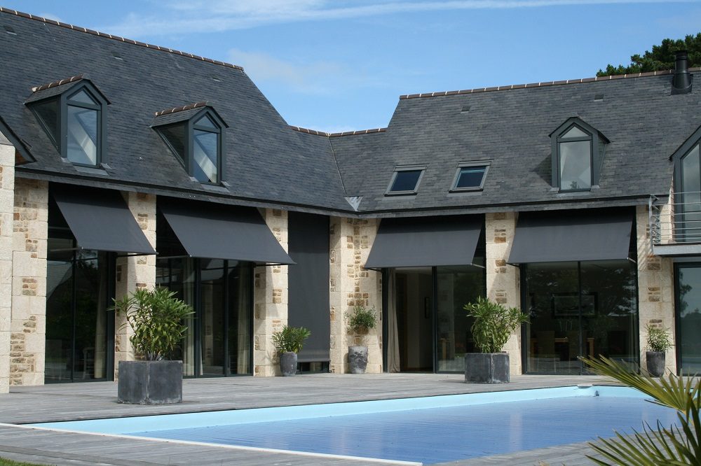 Fall arm awnings